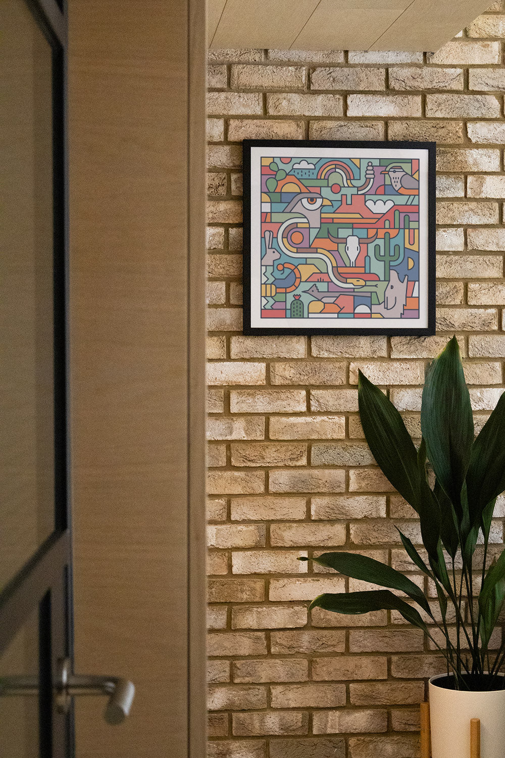 "Desert Study" by Rick Crane, fine art print in black frame, displayed in styled interior setting. |type=lifestyle|