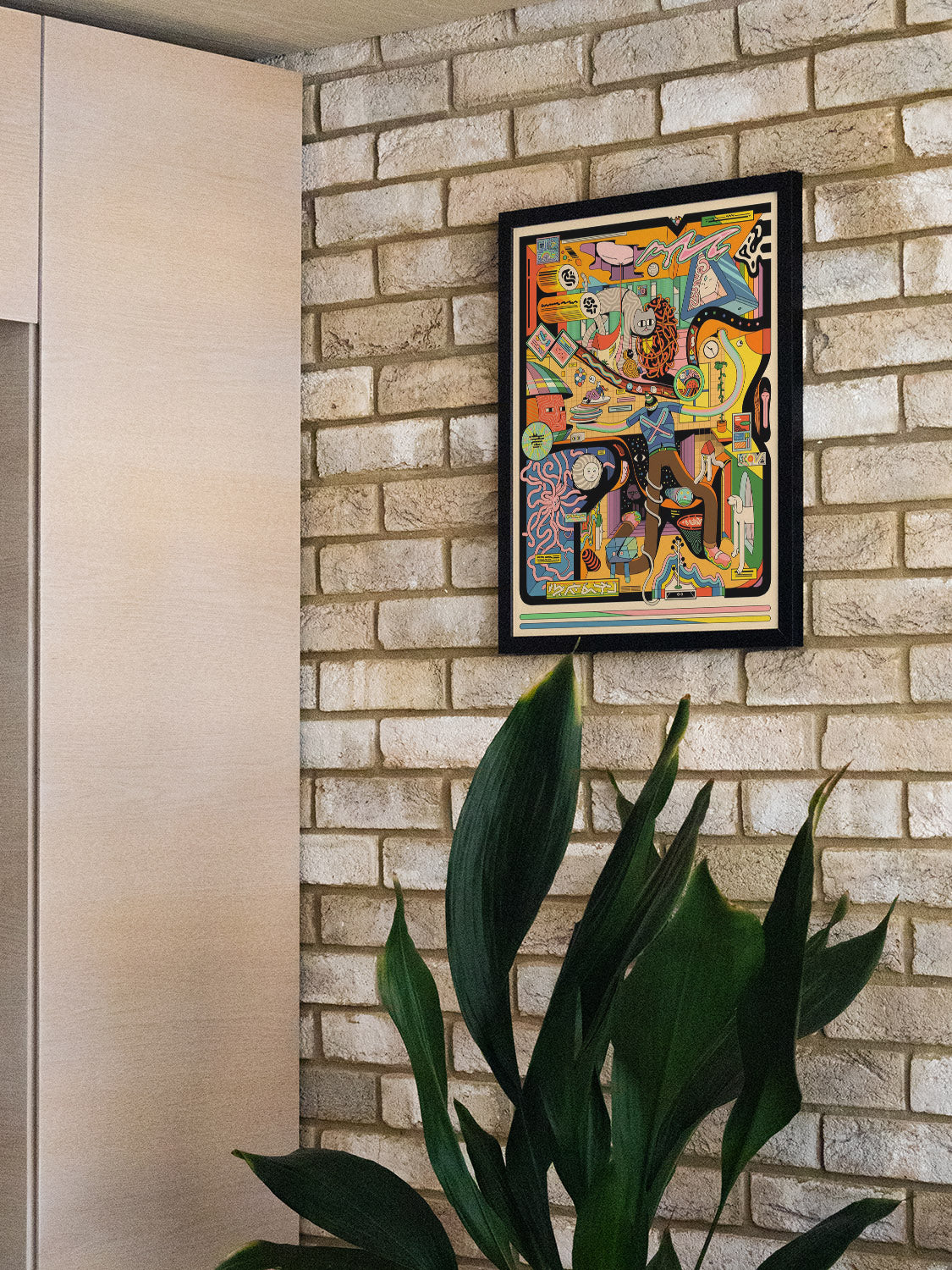 "Framographic2" by Ori Toor in black frame displayed in styled interior, showcasing vibrant abstract design. |type=lifestyle|