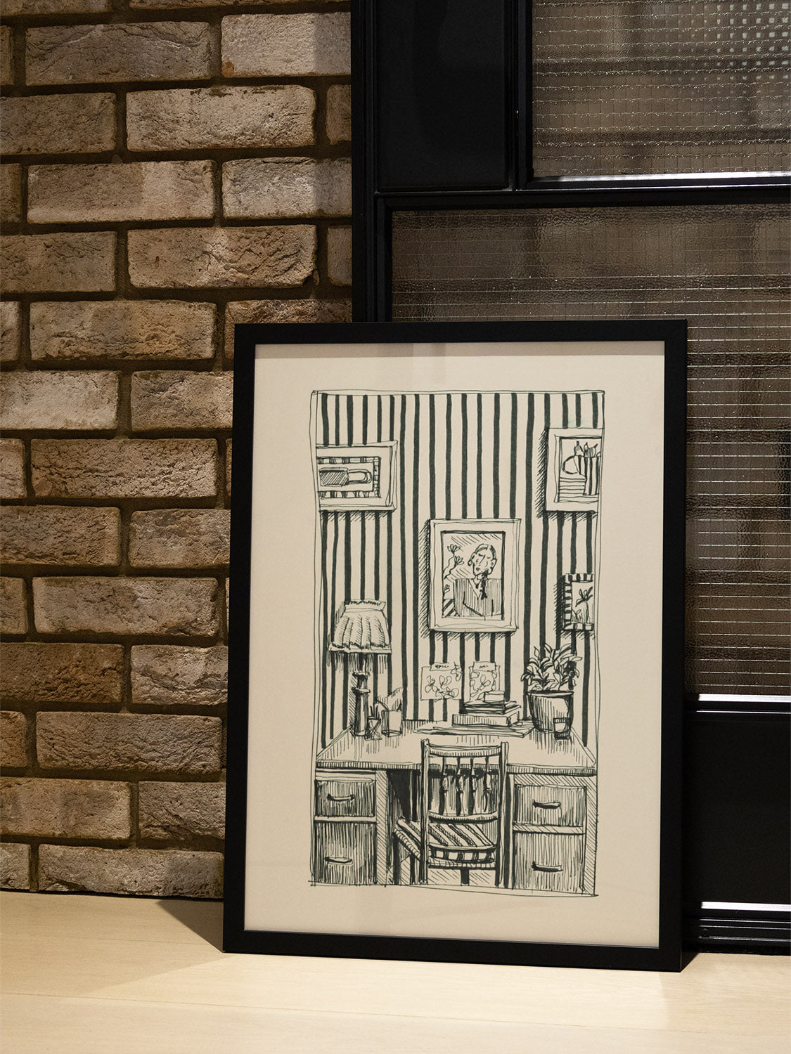 "Work From Home" by Emma Louise in white frame displayed in a cozy interior setting, enhancing modern decor appeal. |type=lifestyle|