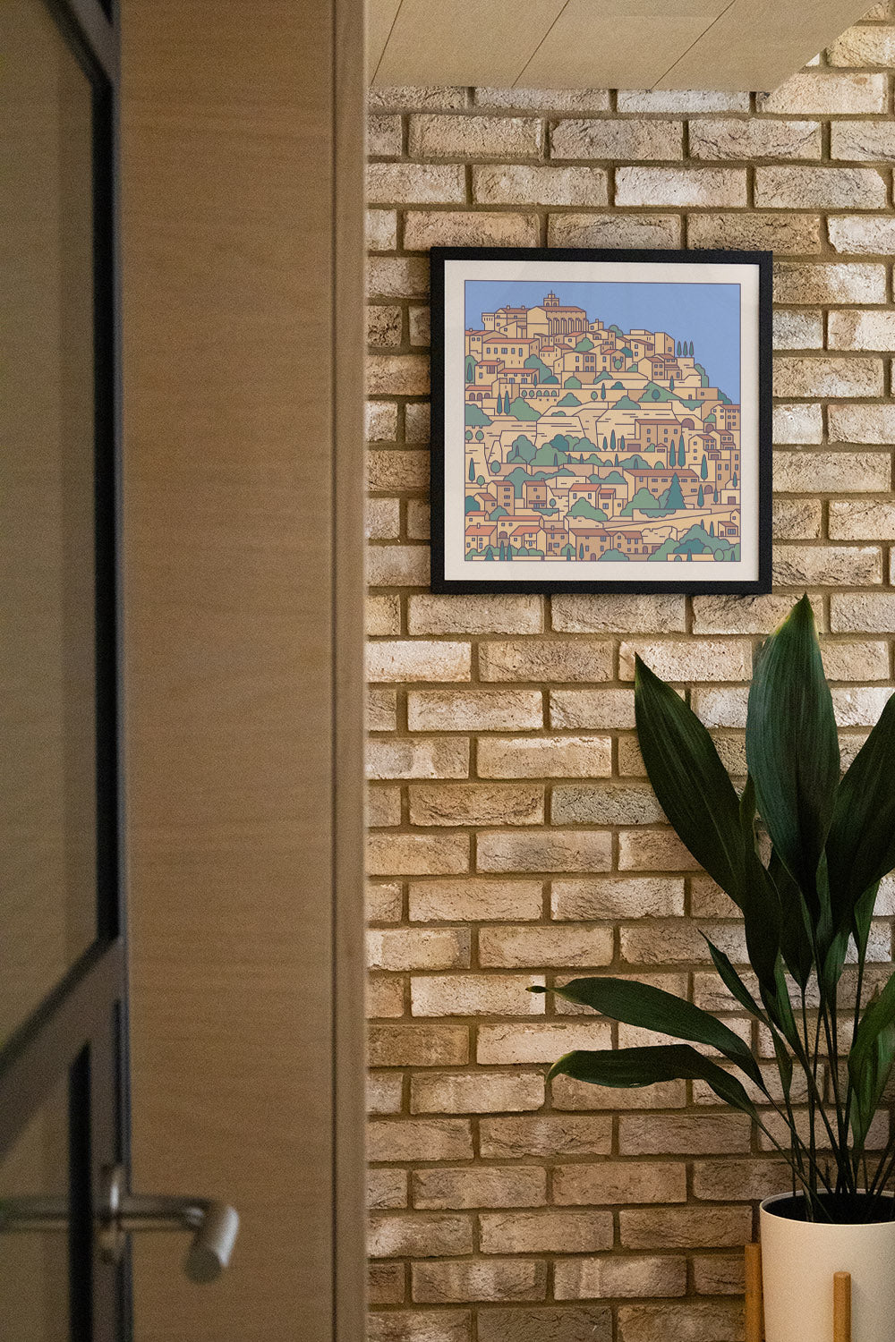 "Settlements 12 – Gordes, France by Rick Crane displayed in a styled interior, in a black frame." |type=lifestyle|