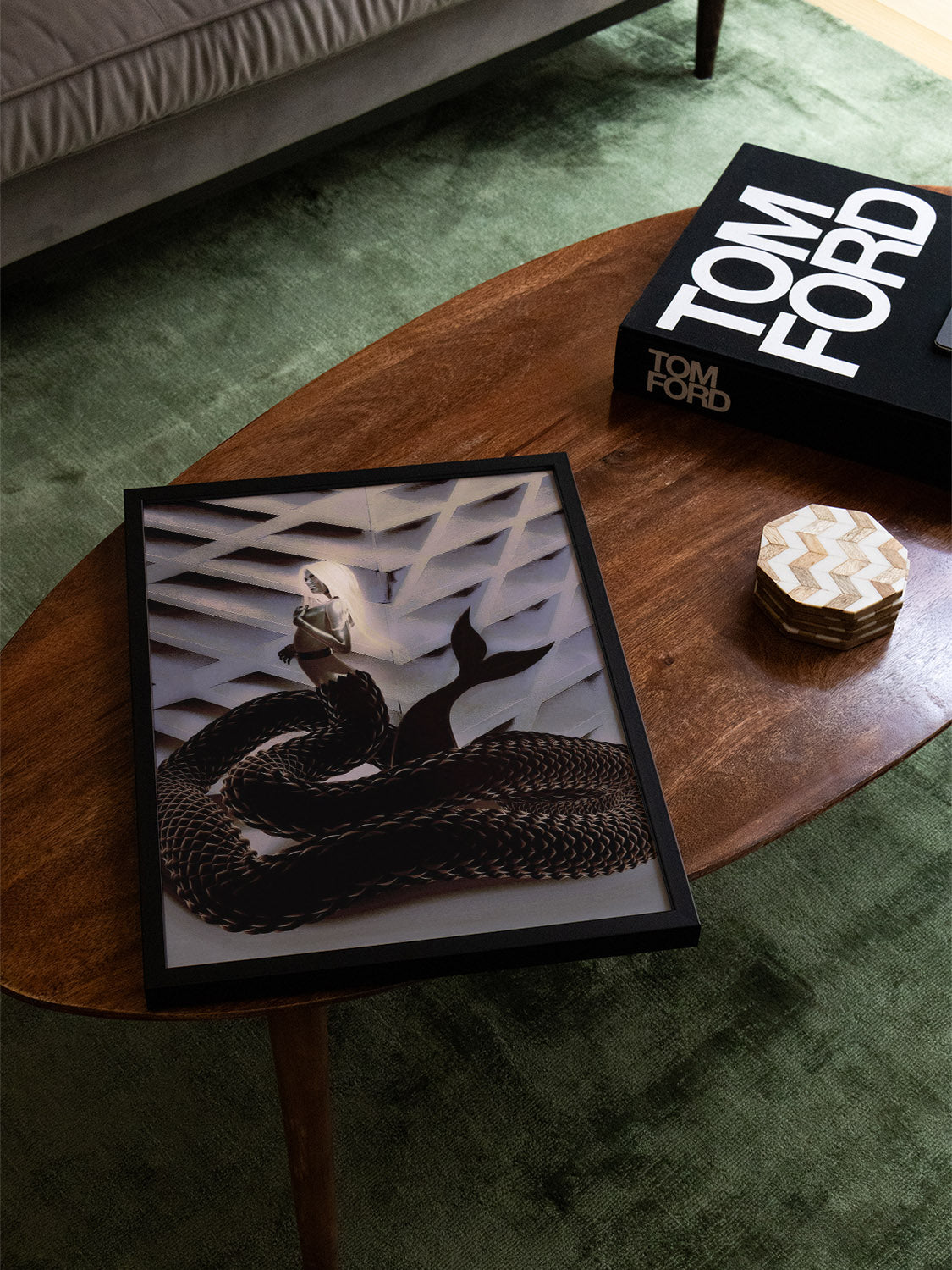 "The Woman Clothed in Mischief" by denisa rahma in black frame displayed in a stylish interior setting.