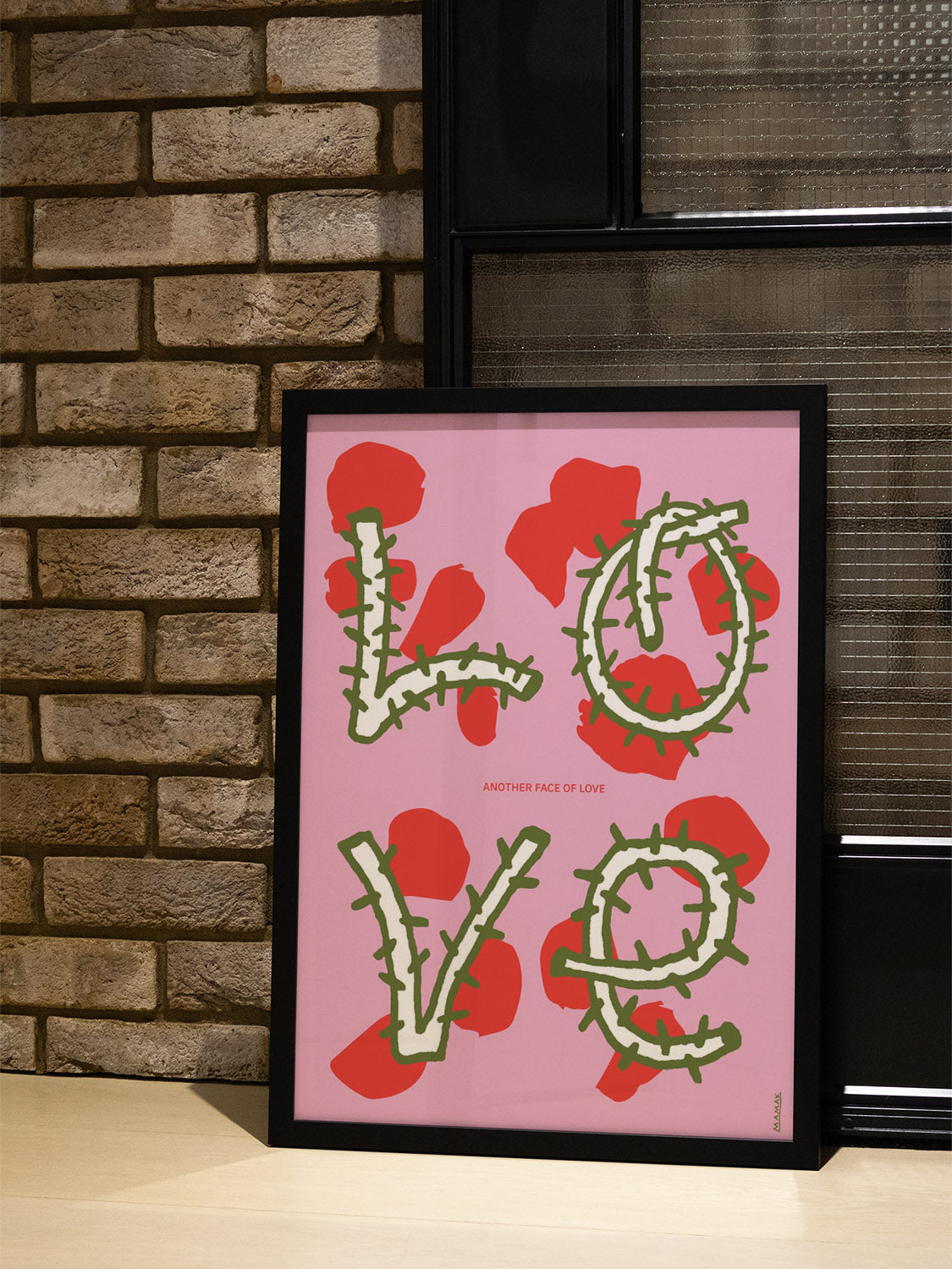 "Another Face Of Love" by Bartosz Mamak, fine art print in black frame displayed in styled interior setting. |type=lifestyle|