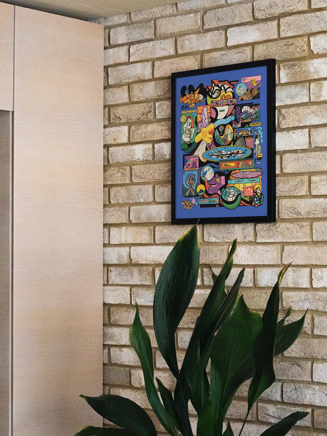 "Tuhrt" art by Ori Toor in white frame, displayed in styled interior setting. |type=lifestyle|