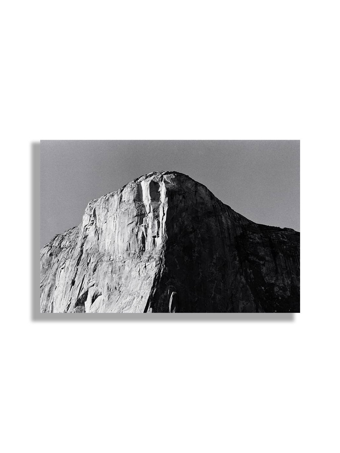 Fine art print "El Capitan" by Adam Sherrett displayed unframed, showcasing a picturesque mountain landscape. |frame=Unframed|