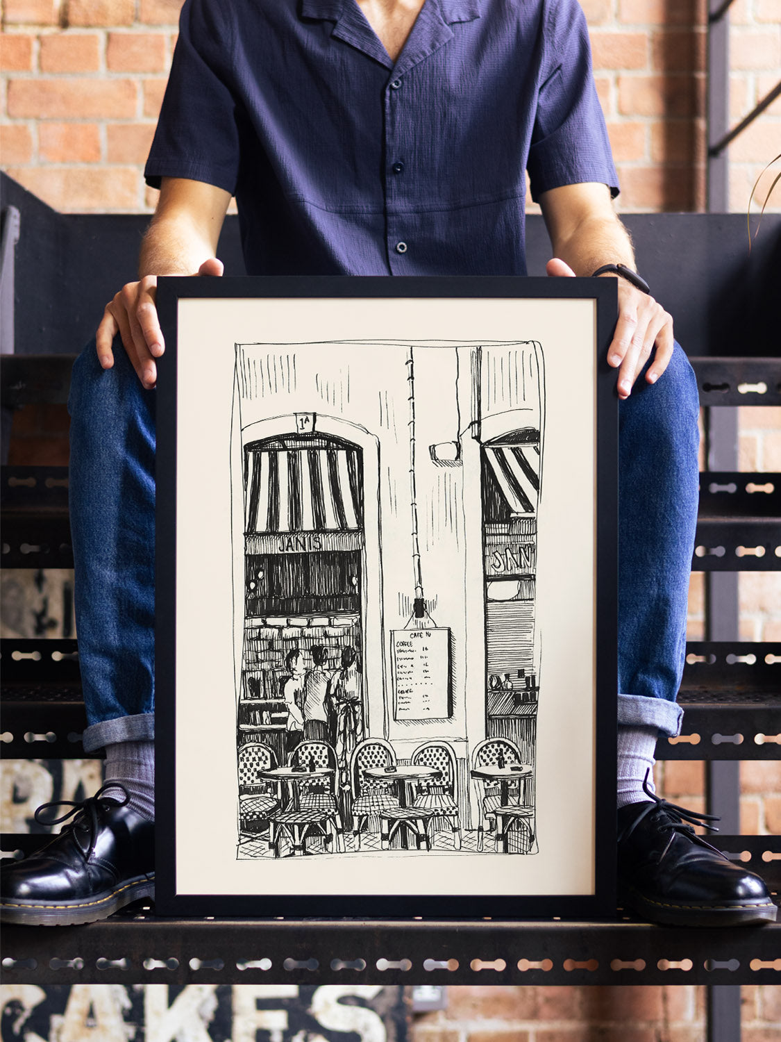 "Cafe Janis" by Emma Louise, fine art print in black frame, displayed in sophisticated interior setting. |type=lifestyle|