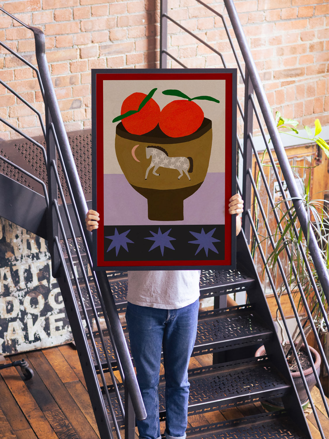 "Oranges In A Vase" by Sophie Deller displayed in stylish room, framed in sleek black frame. |type=lifestyle|