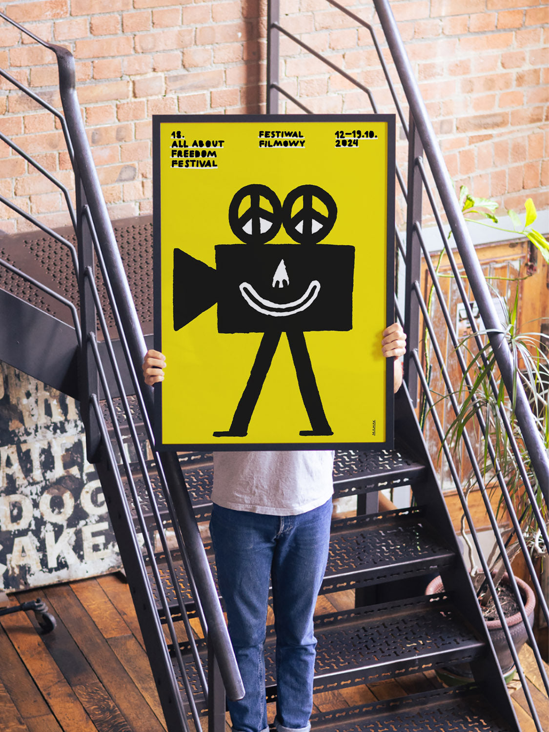 "18th All About Freedom Festival by Bartosz Mamak displayed in white frame, styled interior setting." |type=lifestyle|