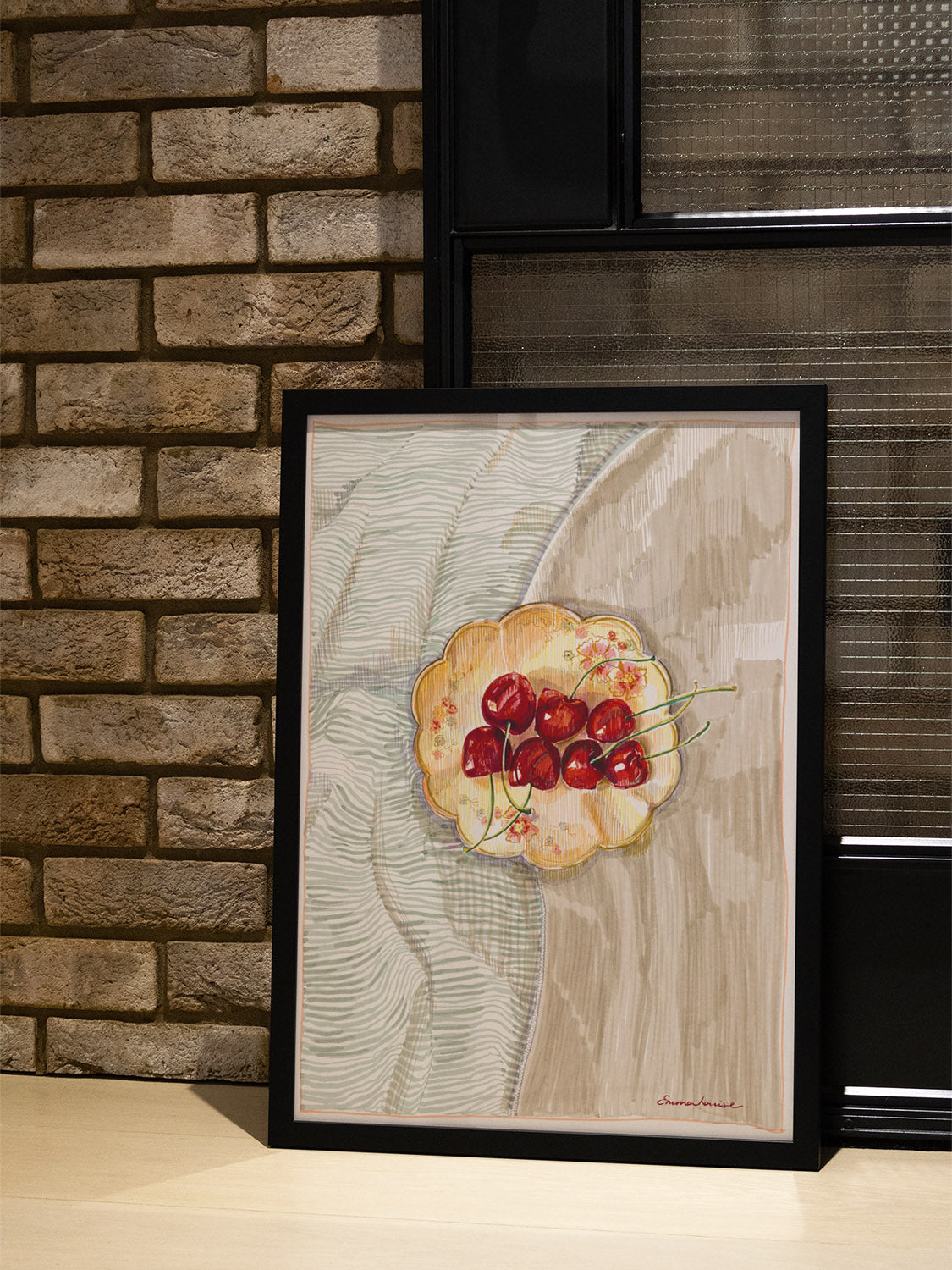 "Cherries by Emma Louise, fine art print in black frame displayed in styled interior setting" |type=lifestyle|