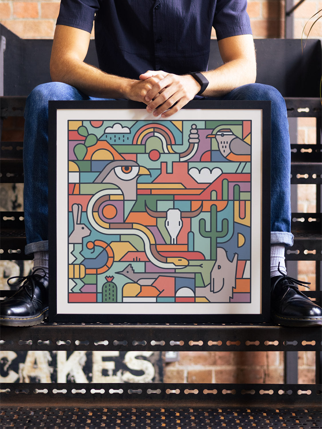 "Desert Study" by Rick Crane displayed in stylish interior, fine art print in black frame. |type=lifestyle|