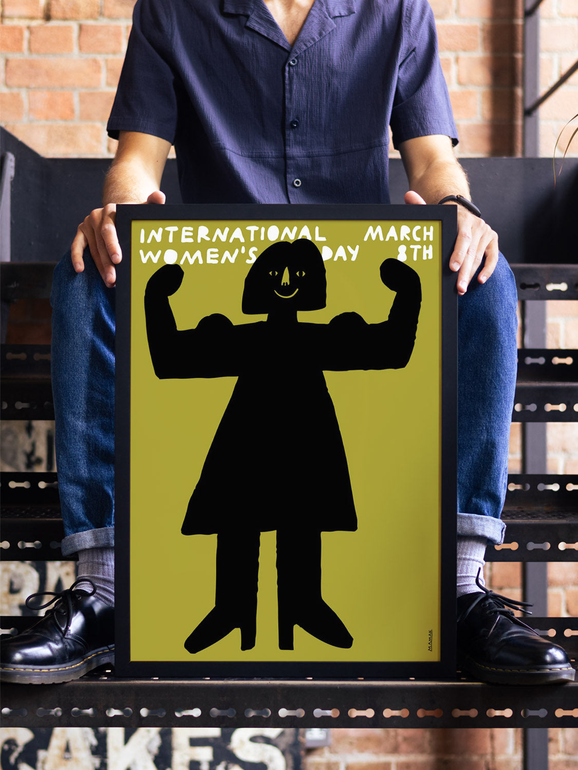 "March 8th | International Women's Day" by Bartosz Mamak, fine art print in black frame displayed in styled interior setting. |type=lifestyle|