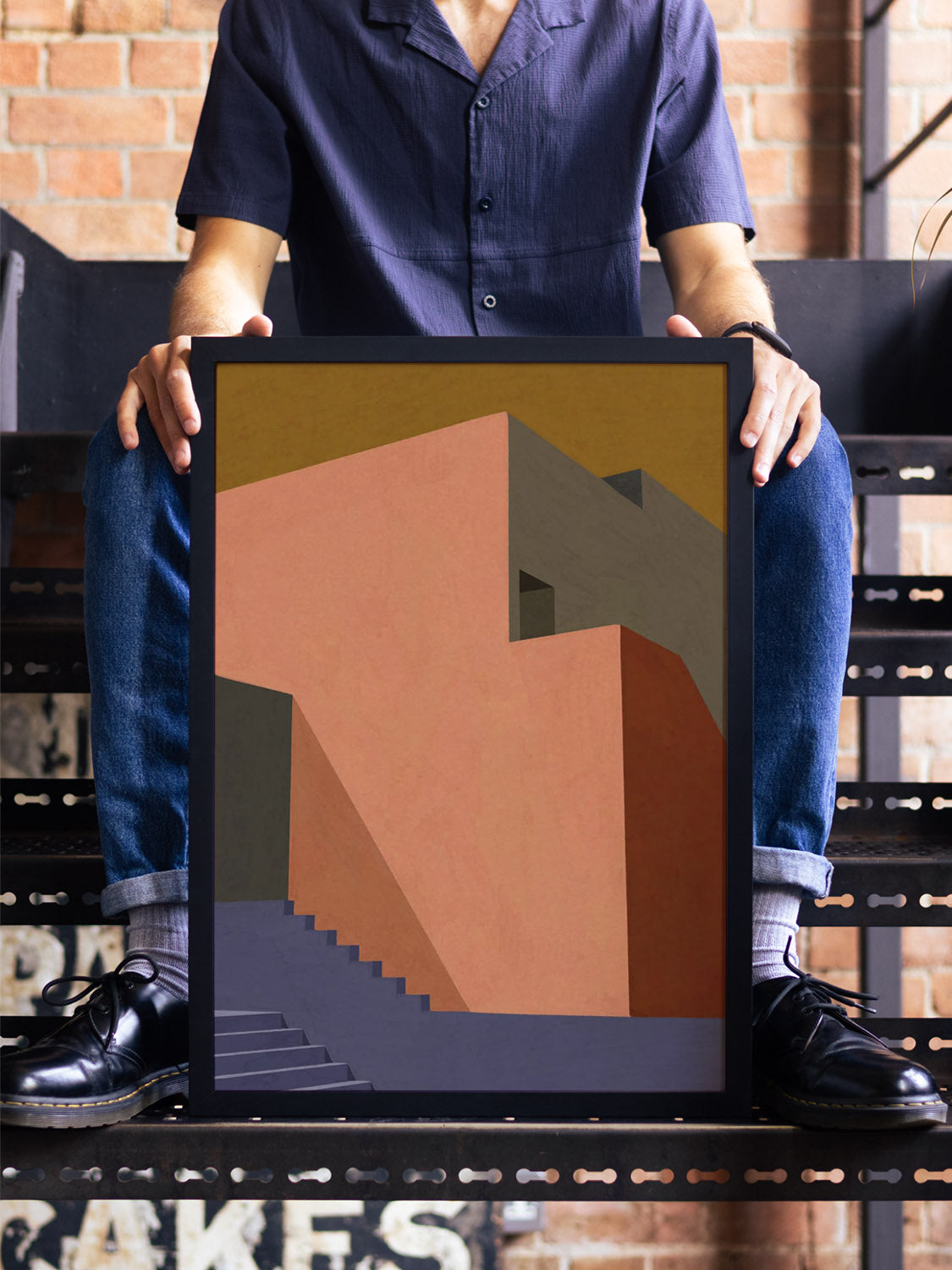 "The Pink Wall Behind The Blue Staircase" by Sophie Deller, fine art print in black frame displayed in styled interior set... |type=lifestyle|