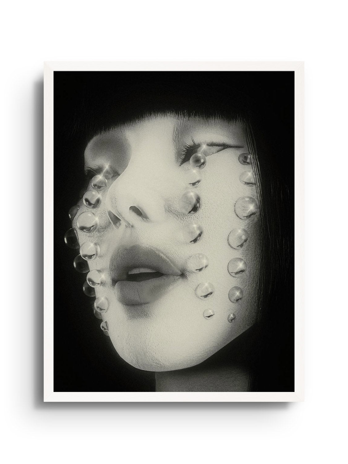 "Tears of Joy" by denisa rahma fine art print in white frame displayed.