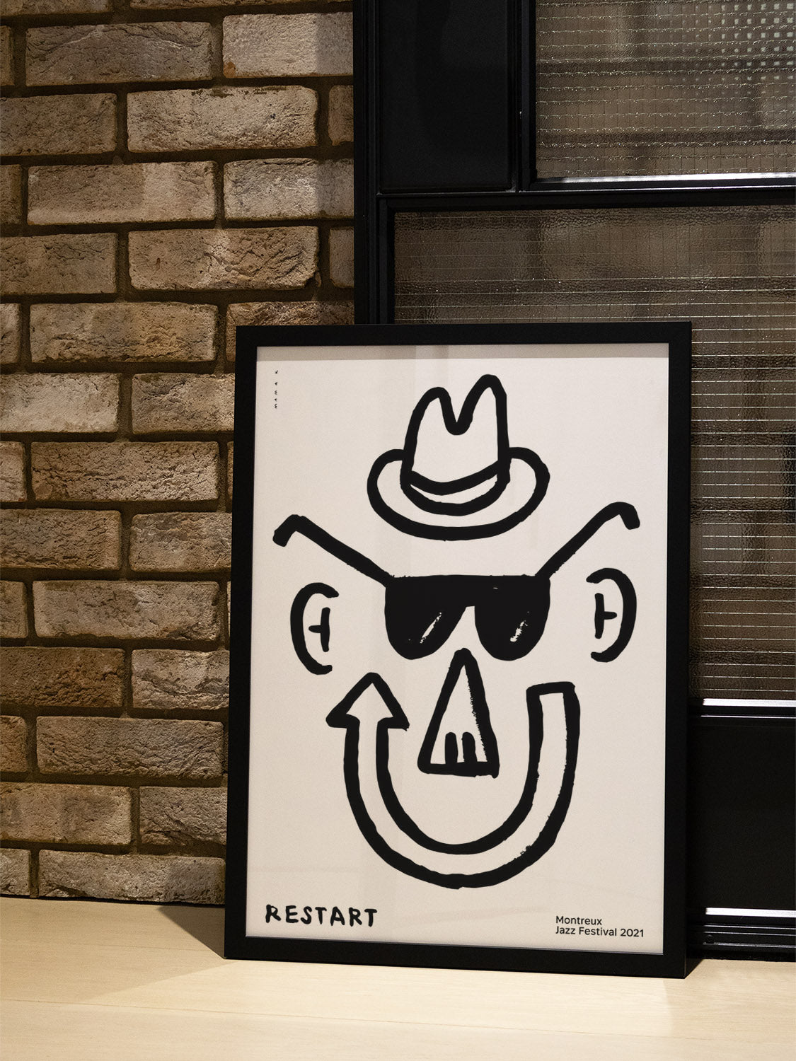 "Montreus Jazz Festival" by Bartosz Mamak in black frame displayed in stylish interior setting. |type=lifestyle|