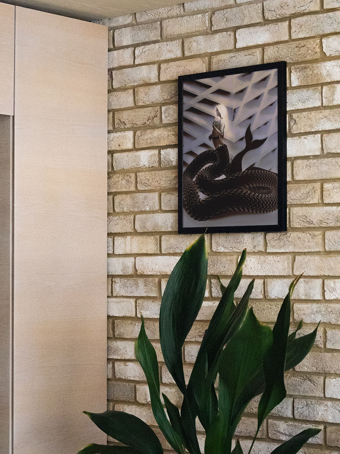 "The Woman Clothed in Mischief" by denisa rahma, fine art print in black frame, displayed in stylish interior setting.