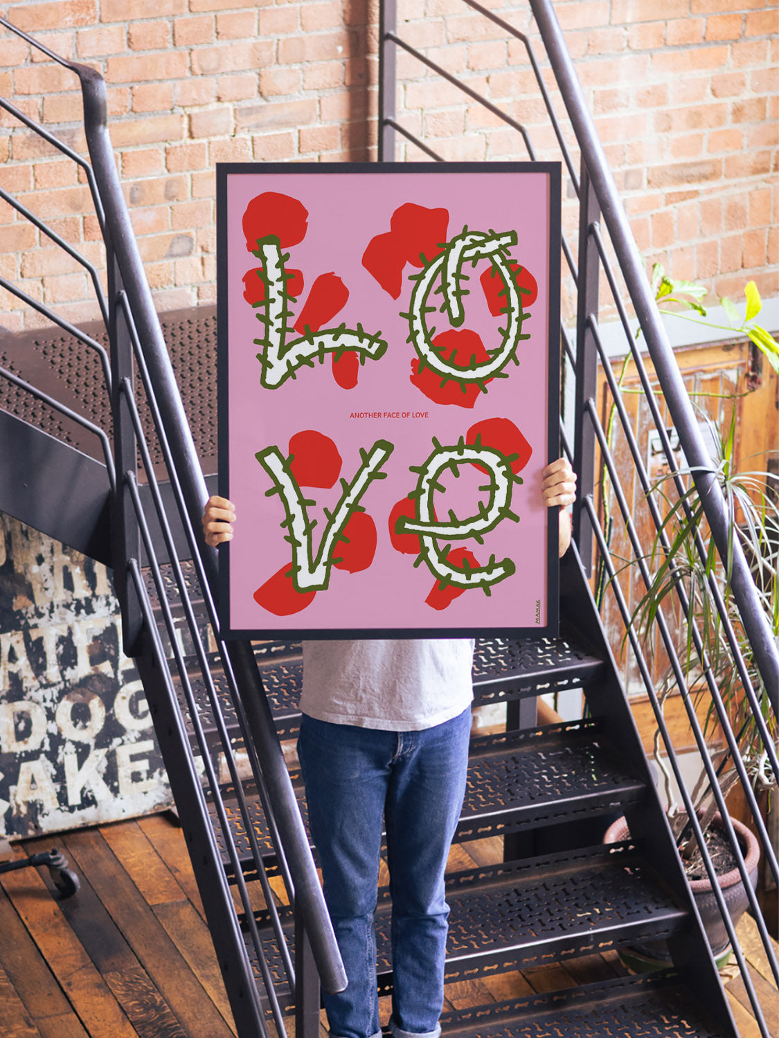 "Another Face Of Love" by Bartosz Mamak, fine art print in black frame displayed in a modern interior setting |type=lifestyle|