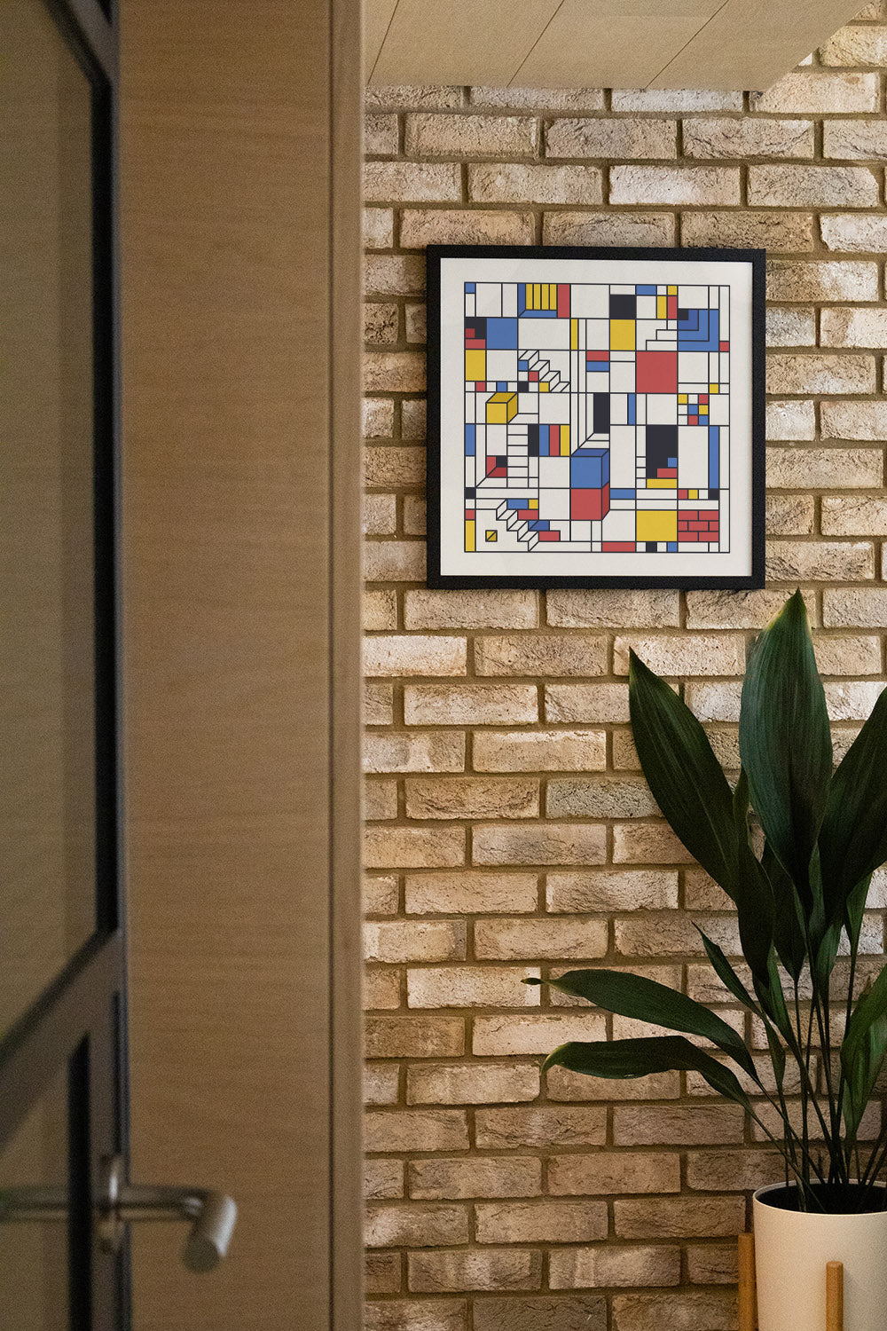 "Piet's Trap" by Rick Crane in black frame displayed in styled interior setting. |type=lifestyle|