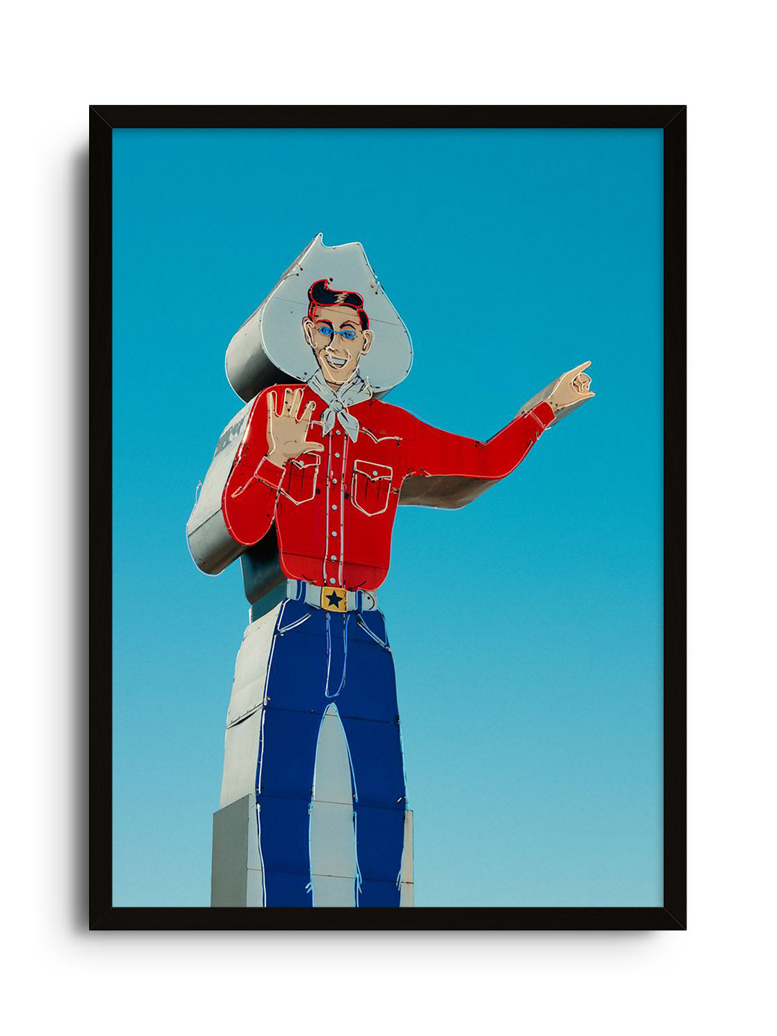 "Head West, Texas" by Philip Jobling, fine art print in black frame, countryside scene with open road and sky.