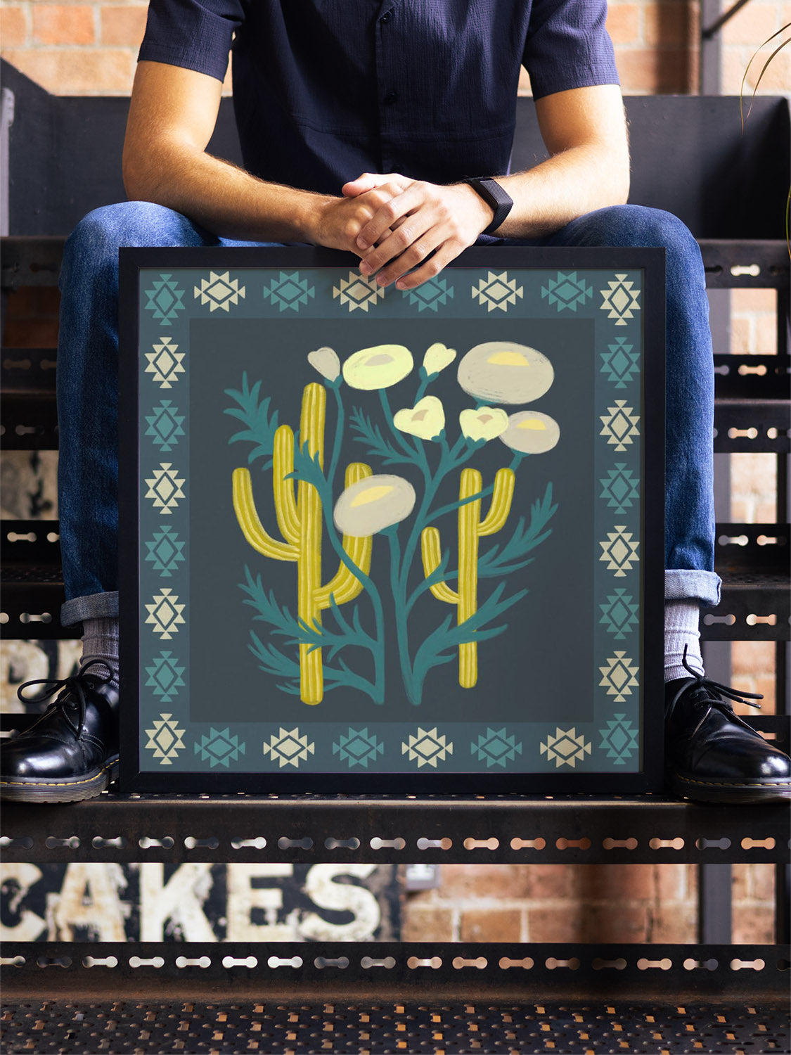 "Cactus Bloom" by Sophia Sky, fine art print in white frame displayed in styled interior setting. |type=lifestyle|