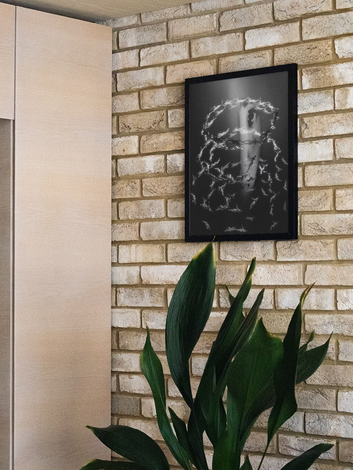 "Year of the Snake" by denisa rahma, fine art print in black frame, displayed in styled interior setting.