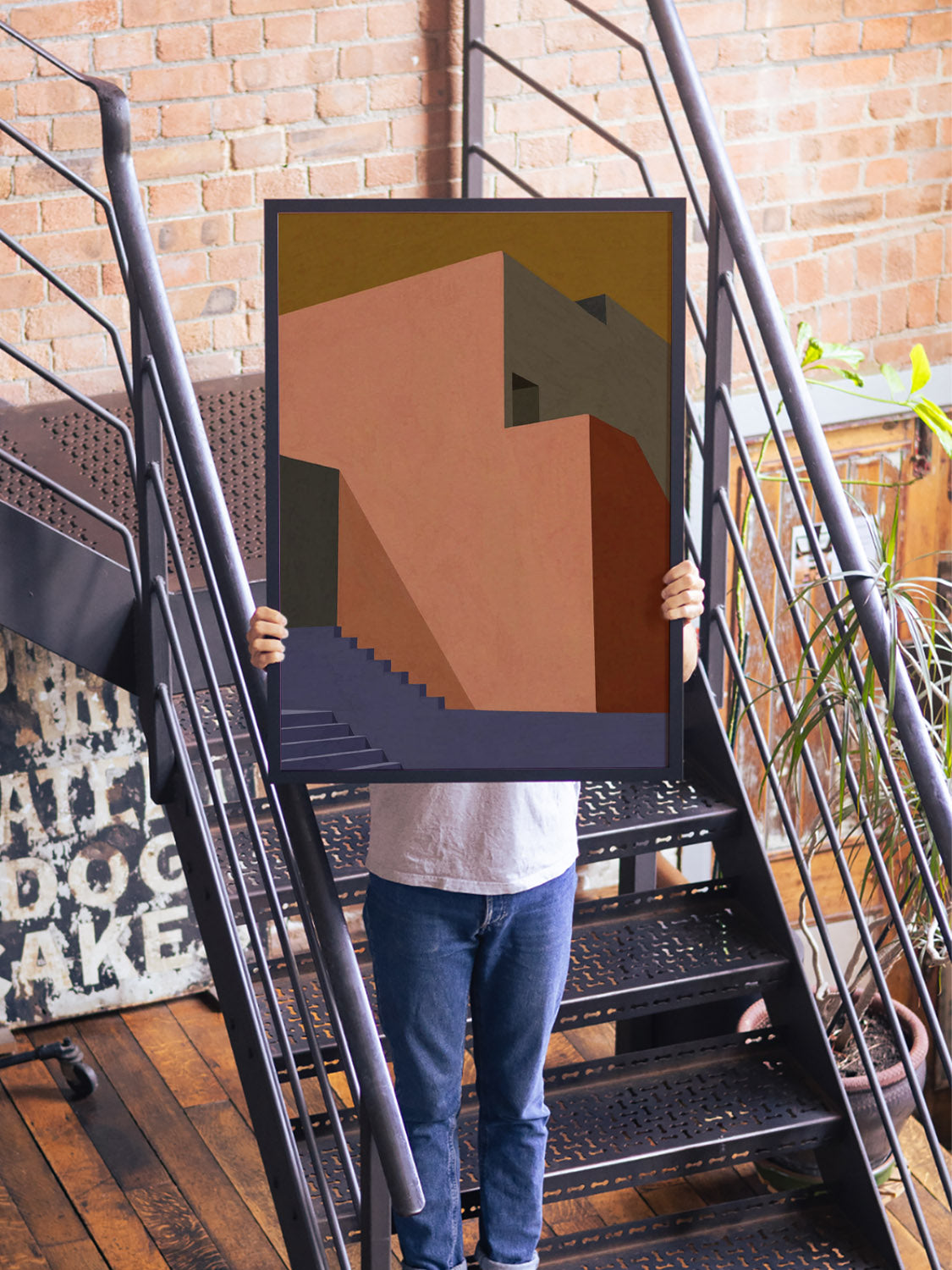 "The Pink Wall Behind The Blue Staircase" by Sophie Deller, fine art print in black frame, displayed in interior setting. |type=lifestyle|