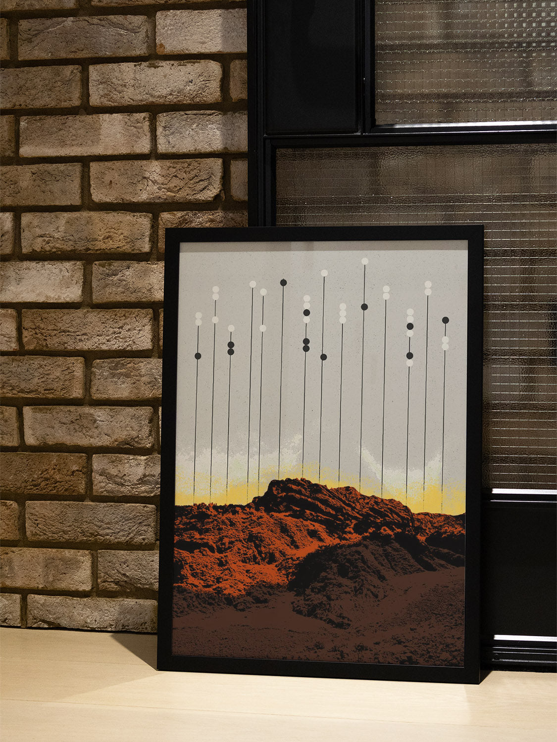 "Krš" by Dusan Lilic in black frame, displayed in styled interior, fine art print showcasing abstract landscape elements. |type=lifestyle|