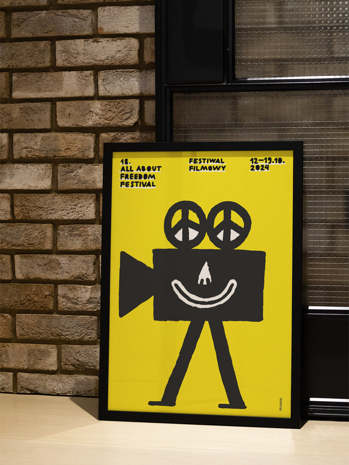 "18th All About Freedom Festival" by Bartosz Mamak in black frame displayed in styled interior setting. |type=lifestyle|