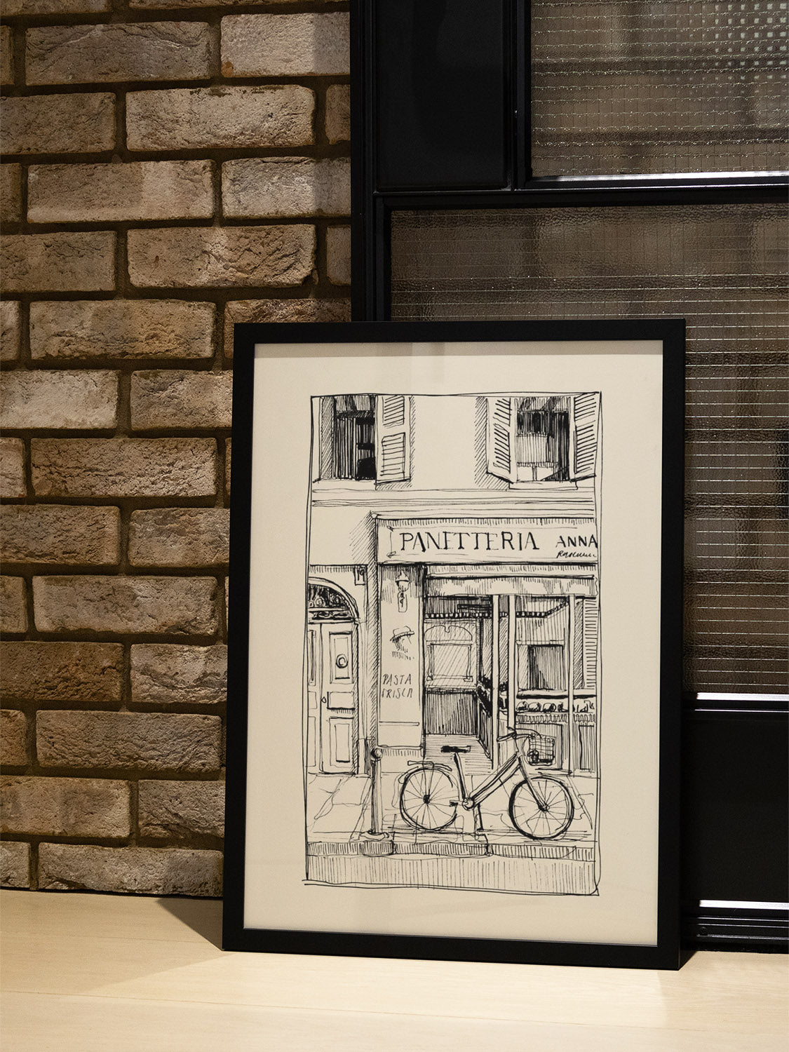 "Panetteria" by Emma Louise, fine art print in a white frame displayed in a styled interior setting. |type=lifestyle|