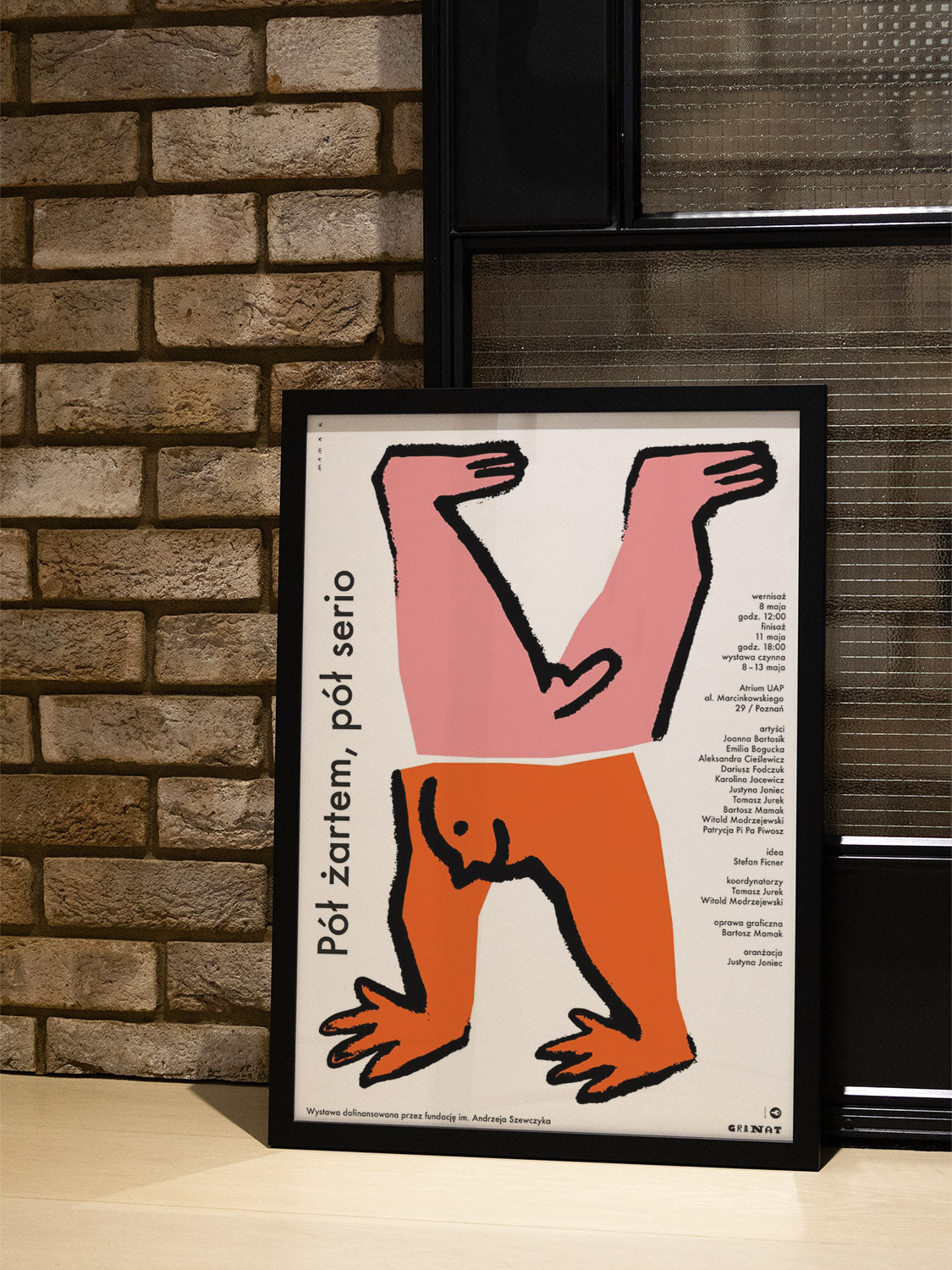 "Half Joking Half Serious" by Bartosz Mamak displayed in a stylish interior, framed in a sleek black frame. |type=lifestyle|