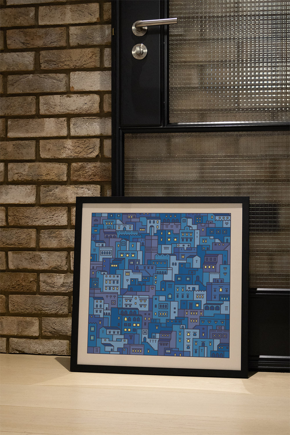 "Settlements 04 – Chefchaouen, Morocco by Rick Crane in white frame displayed in styled interior setting" |type=lifestyle|