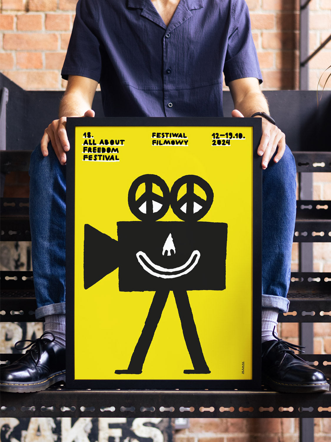 "18th All About Freedom Festival by Bartosz Mamak in black frame, showcased in a contemporary interior setting" |type=lifestyle|